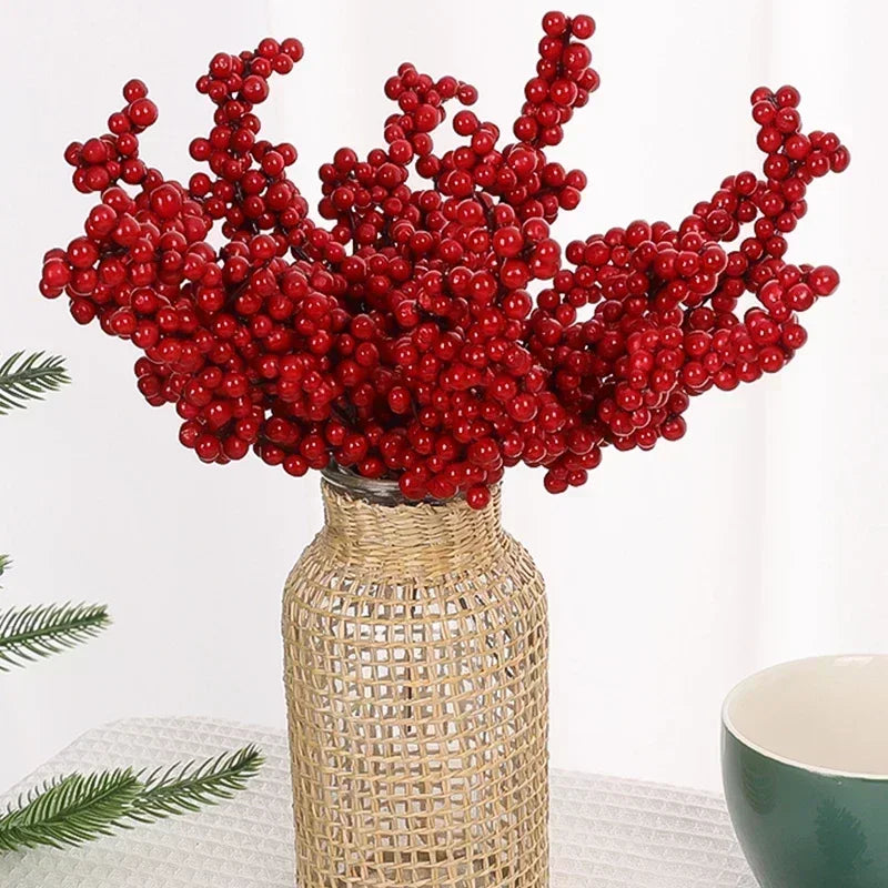 Holly berry picks in a vase