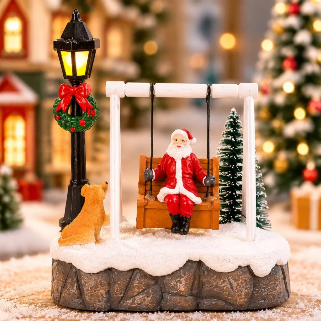 Light-up Santa on a swing figurine