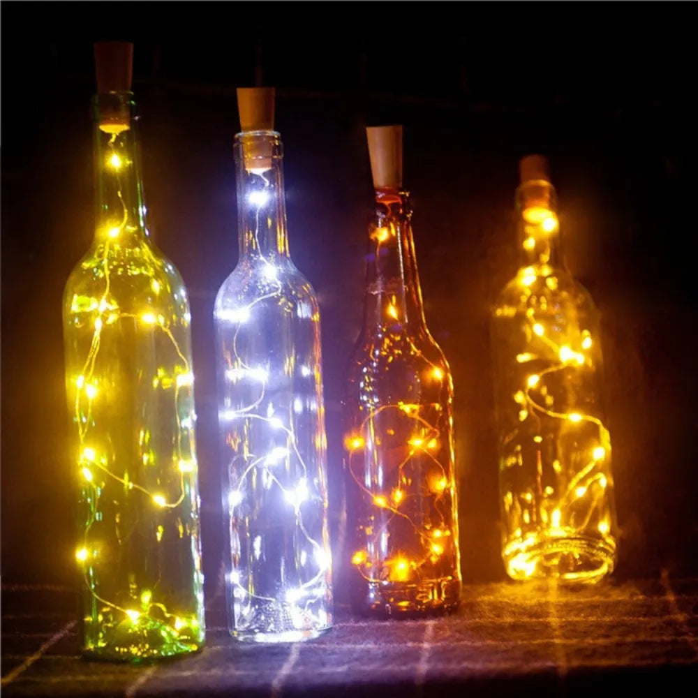 Cork lights glowing in bottles