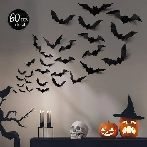 Flying bat decorations on a window for Halloween