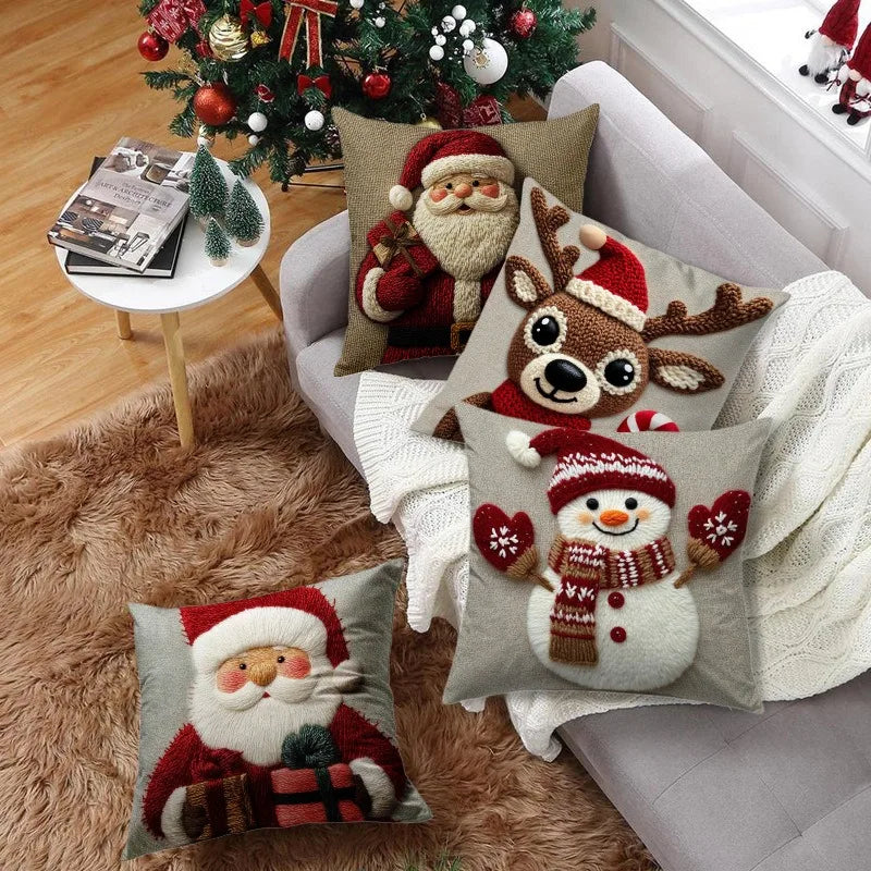 Santa and reindeer Christmas cushion on a sofa