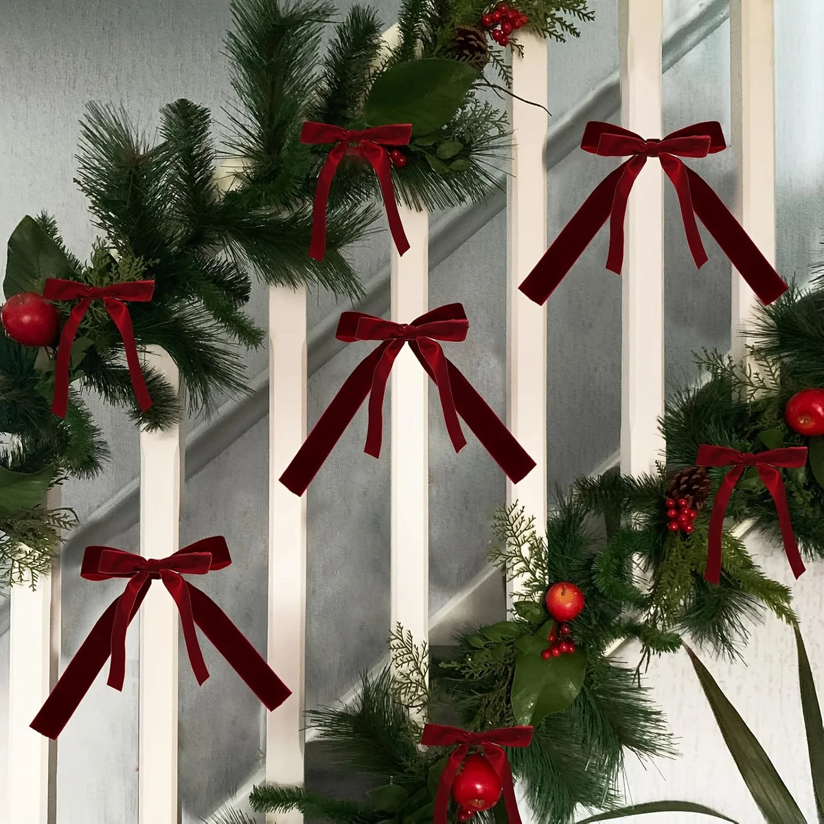 Burgundy bows on a Christmas tree