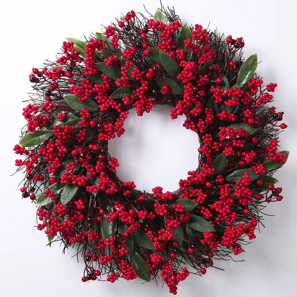 Handmade Christmas wreath with red berries and eucalyptus