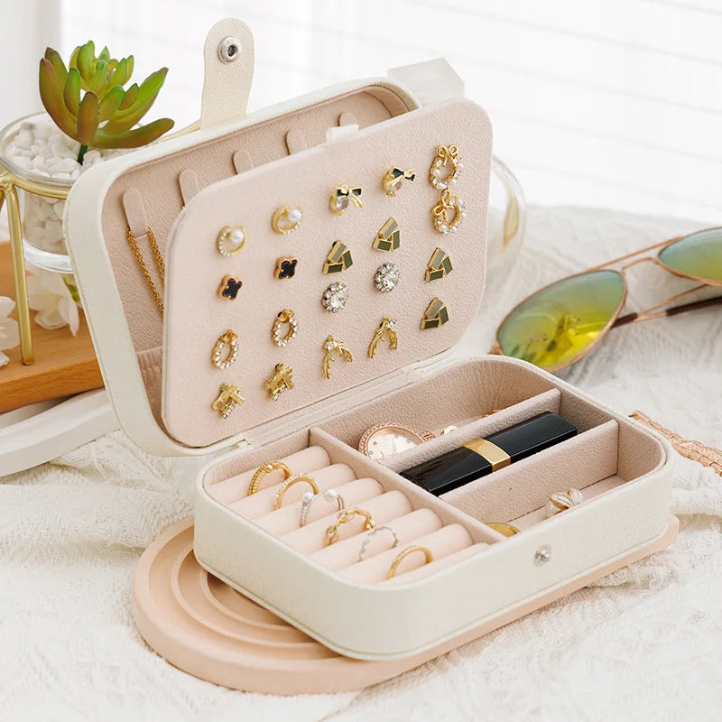 Jewellery organiser open with rings and earrings