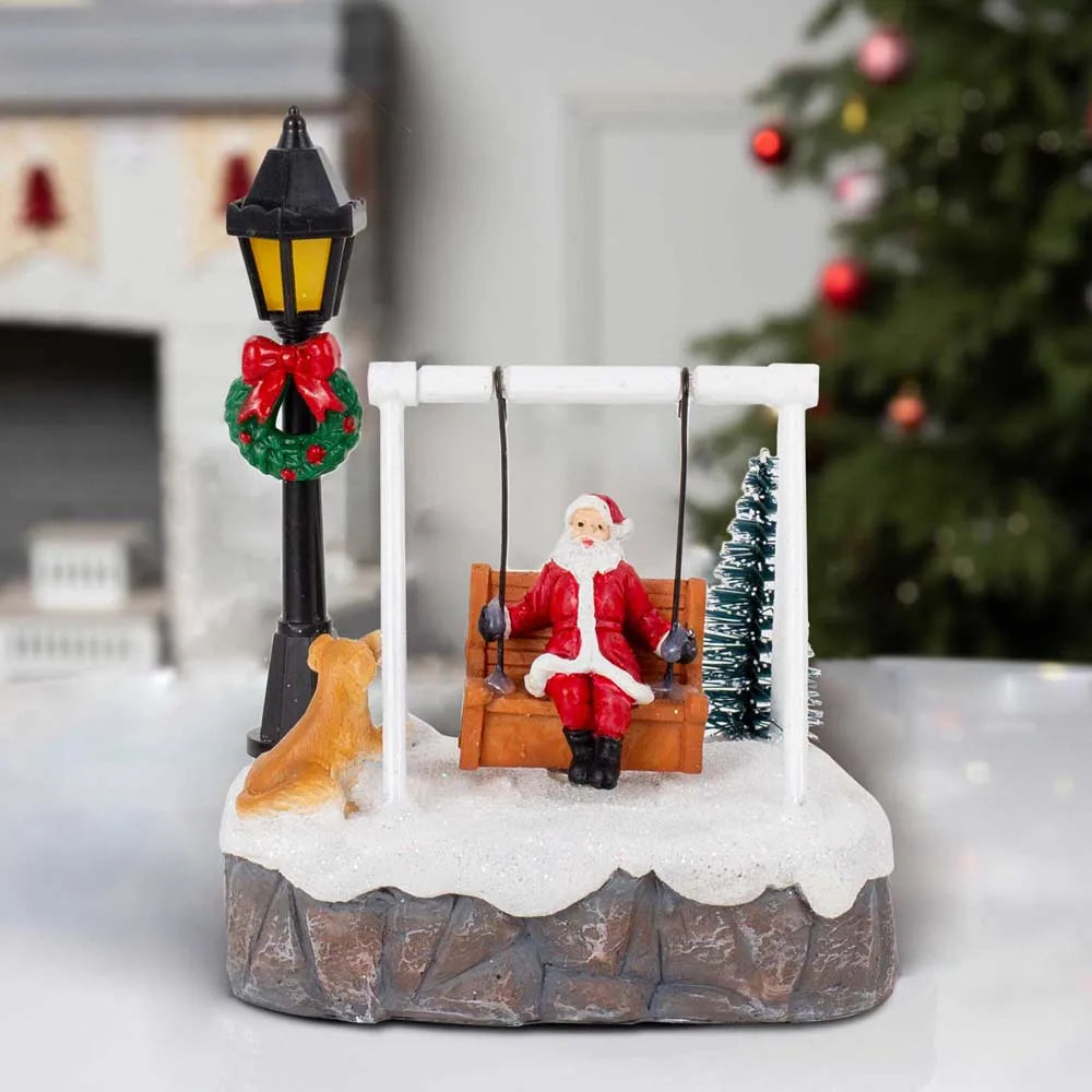 Light-Up Santa on a Swing – LED Christmas Village Figurine